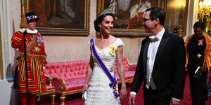 Kate Middleton and United States Secretary of the Treasury, Steven Mnuchin arrive through the East Gallery for a State Banquet at Buckingham Palace on June 3, 2019 in London, England.
