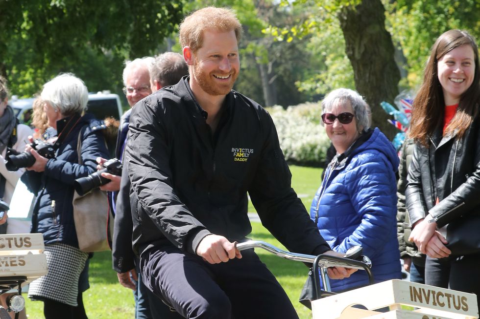 Prince Harry wore a top that said 'Daddy' on his first day back to work