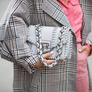 berlin, germany   may 08 aline kaplan is seen wearing grey trench coat aeron studio, pink blouse and pants mango, proenza schouler bag on may 08, 2019 in berlin, germany photo by christian vieriggetty images