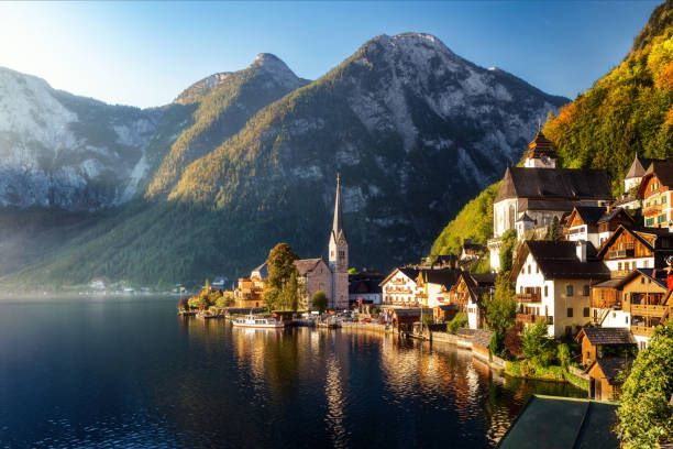 panoramic view of hallstatt old city on hallstätter see lake in the autumn sunny morning
