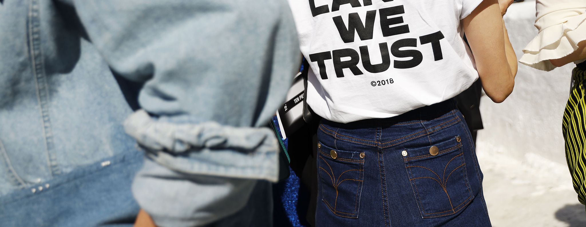 People, Jeans, Youth, Denim, Human, T-shirt, Protest, Textile, Tree, Outerwear, 