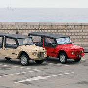 nice, france   may 21, 2019 two citroen mehari side view, french retro cars parked in a parking lot in nice on the french riviera, red and beige colors