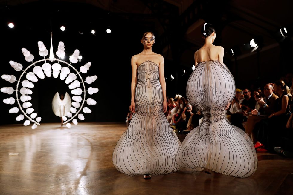 topshot   models present creations by iris van herpen during the womens fall winter 20192020 haute couture collection fashion show in paris, on july 1, 2019 photo by thomas samson  afp photo by thomas samsonafp via getty images