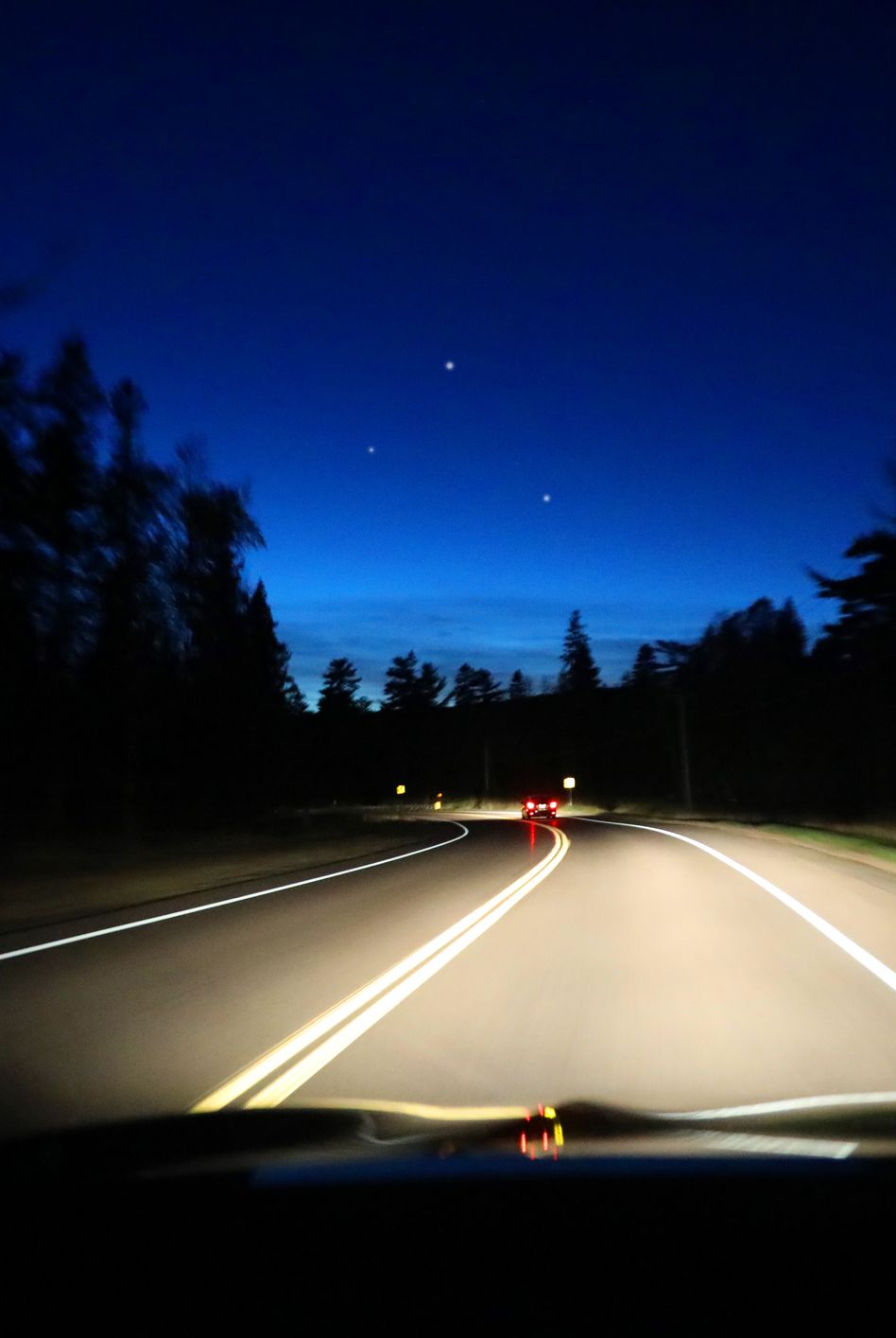 Sky, Road, Night, Highway, Light, Mode of transport, Road trip, Tree, Infrastructure, Automotive lighting, 