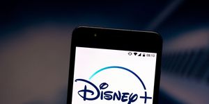 In this photo illustration a Disney+ (Plus) logo seen