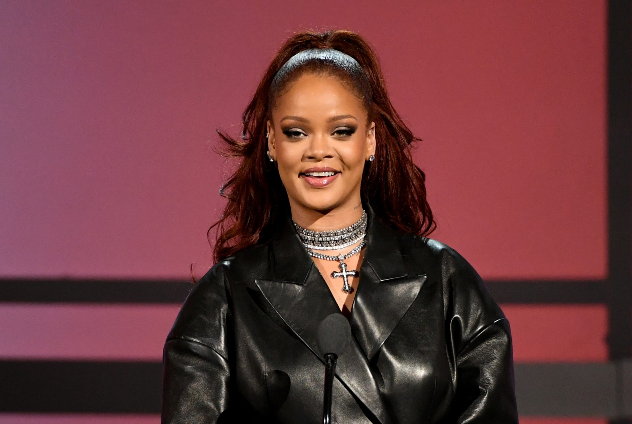 Rihanna wants to cheer up a troubled world with fashion show