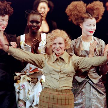 british designer vivienne westwood acknowledges applause on march 14, 1997 in paris at the end of her mary queen of scots inspired 199798 fallwinter ready to wear collection photo by eric feferberg  afp photo credit should read eric feferbergafp via getty images