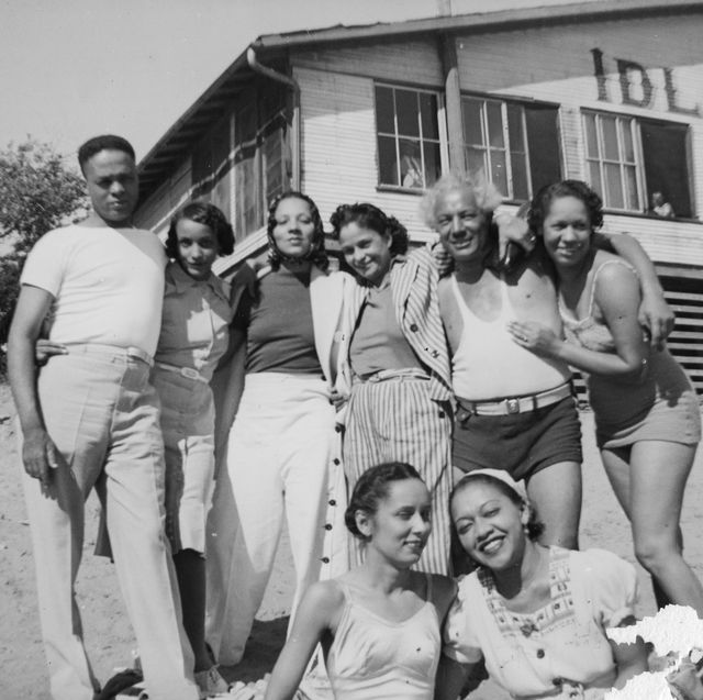 portrait of a group of unidentified people friends andor family members of future newspaper publisher john h sengstacke as they pose on the beach outside the idlewild club house, idlewild, michigan, september 1938 idlewild, known as the black eden, was a resort community that catered to african americans, who were excluded from other resorts prior to the passage of the civil rights act of 1964 photo by the abbott sengstacke family papersrobert abbott sengstackegetty images