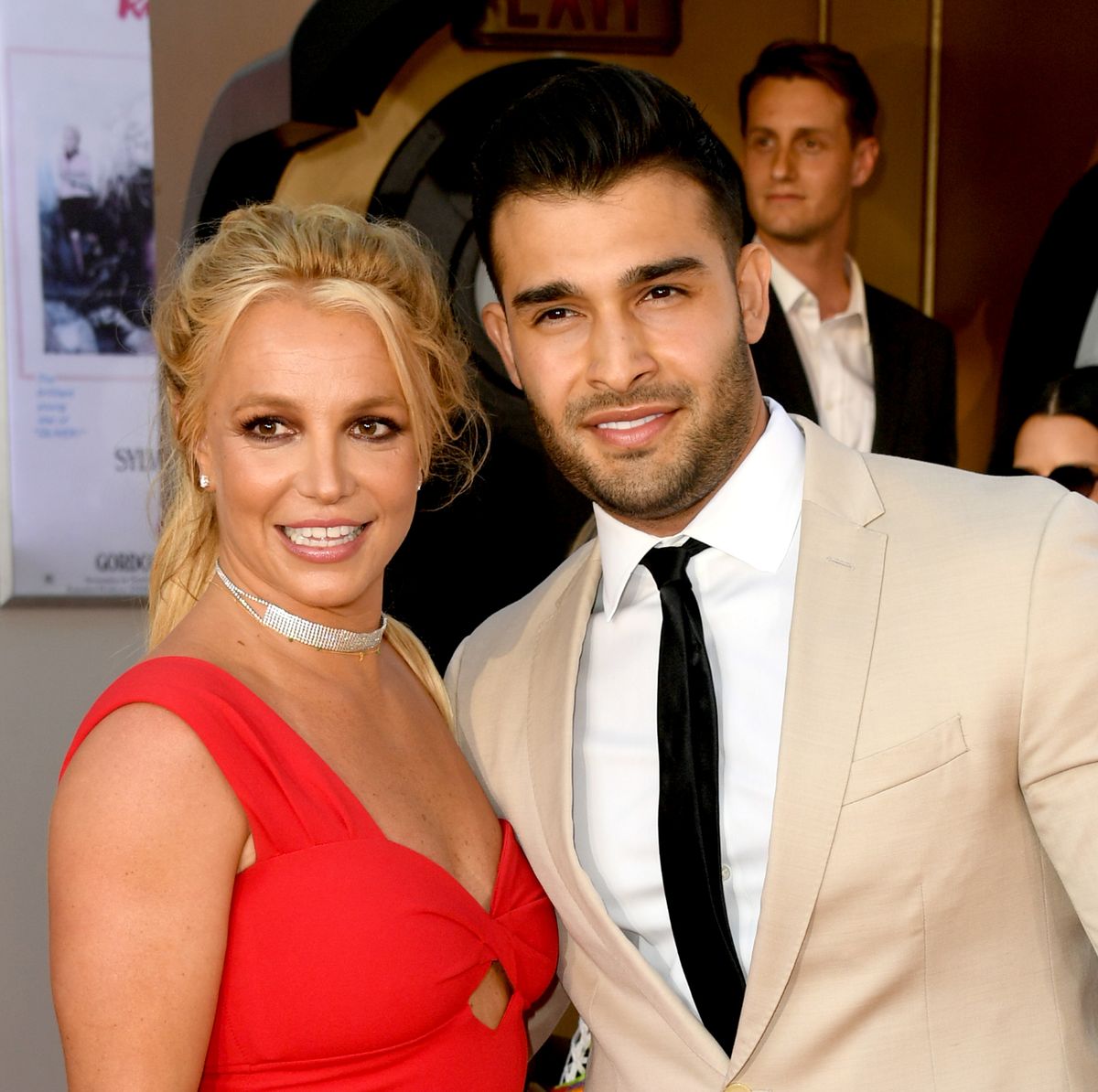 sam asghari found a picture of a shirtless brad pitt in britney spears’ wardrobe