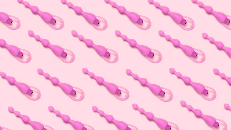 adult sex toy pattern on pink background top view, flat lay minimal erotic concept