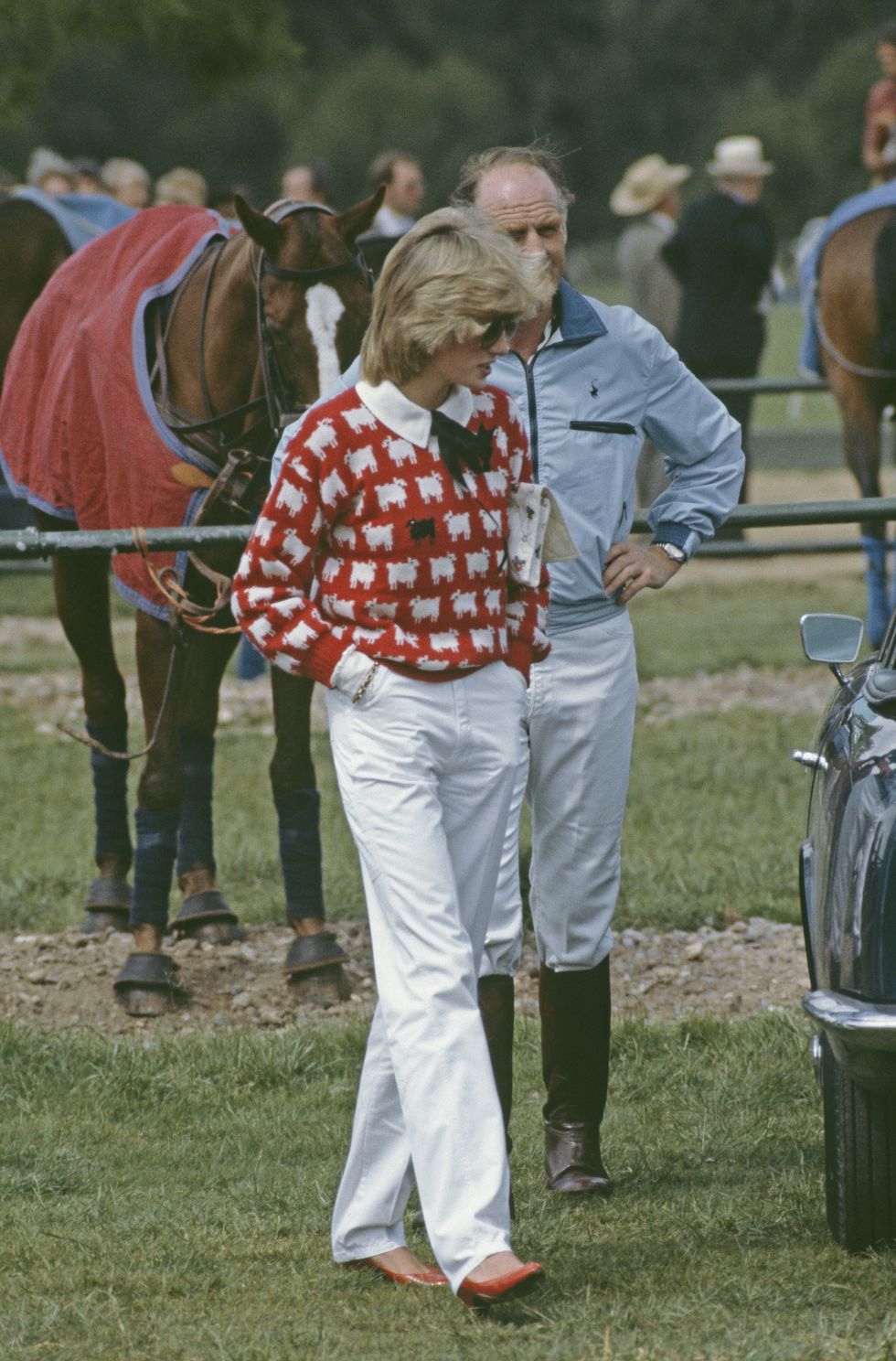 diana, princess of wales 1961 1997 with major ronald ferguson 1931 2003 at a polo match at smiths lawn, guards polo club, windsor, june 1983 diana is wearing a muir and osborne black sheep sweater photo by princess diana archivegetty images