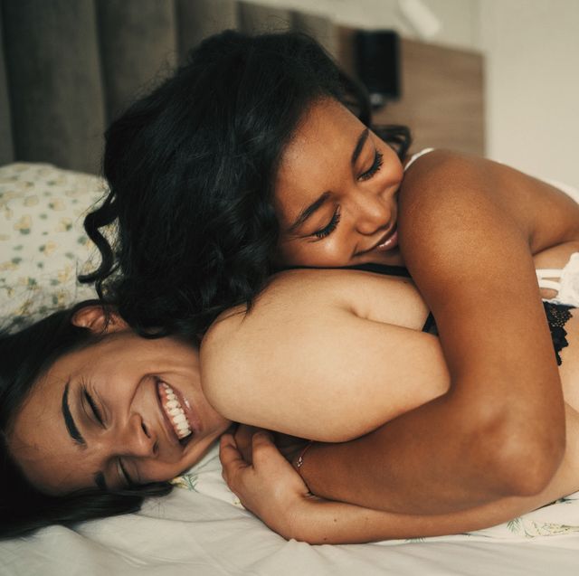 two beautiful sexy women lesbian couple in the bed