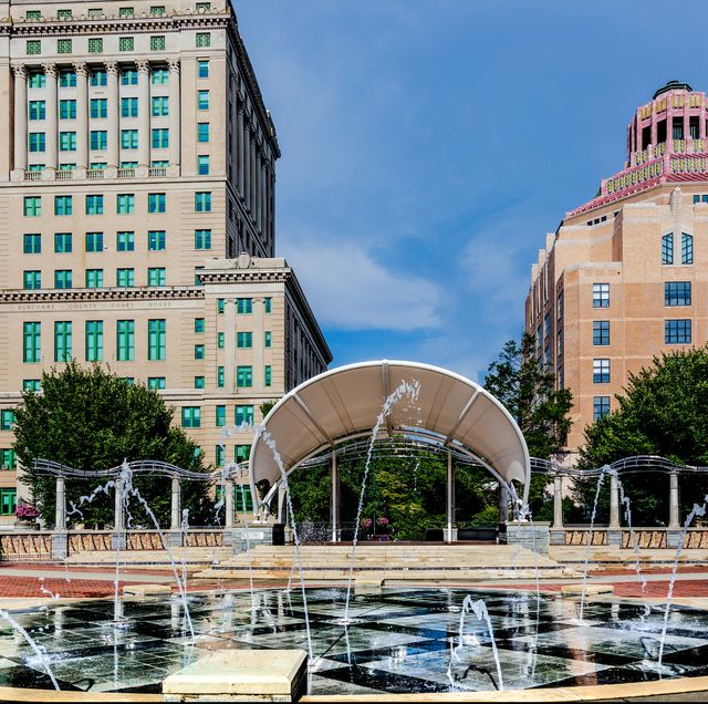 asheville, nc, usa 21 august 2019 the splash pad in pack square, in front of the courthouse, city administration building, and covered stage