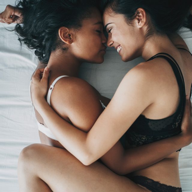 two beautiful sexy women lesbian couple in the bed