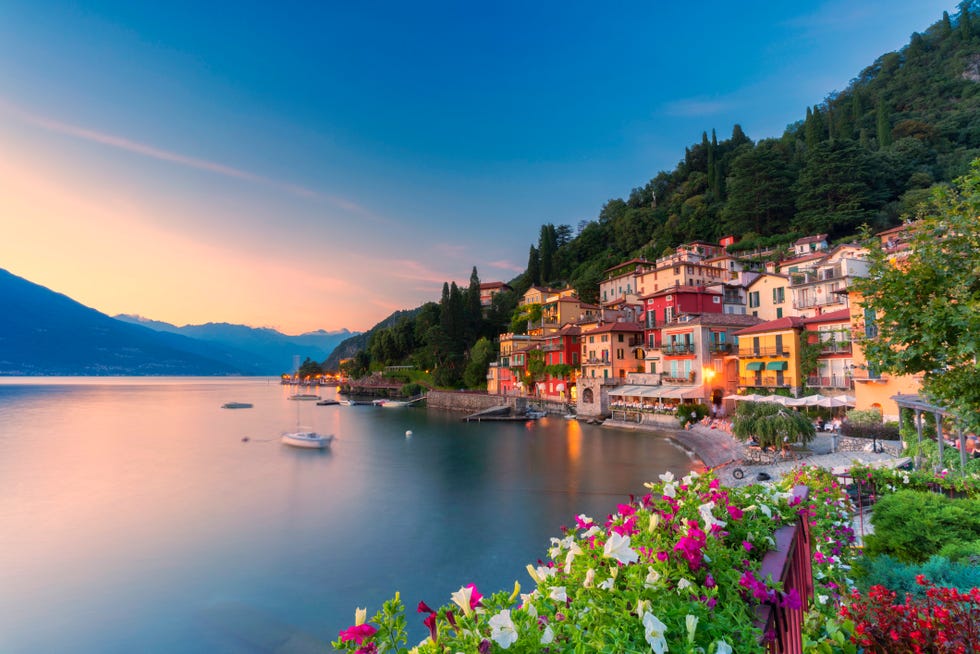 sunset over the traditional village of varenna on shore of lake como, lecco province, lombardy, italy