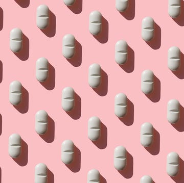 Is Metformin a Wonder Drug rows of white tablets on a pink background