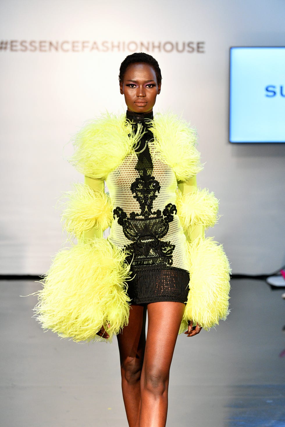 Fashion model, Fashion, Clothing, Fashion show, Yellow, Runway, Shoulder, Haute couture, Fashion design, Dress, 