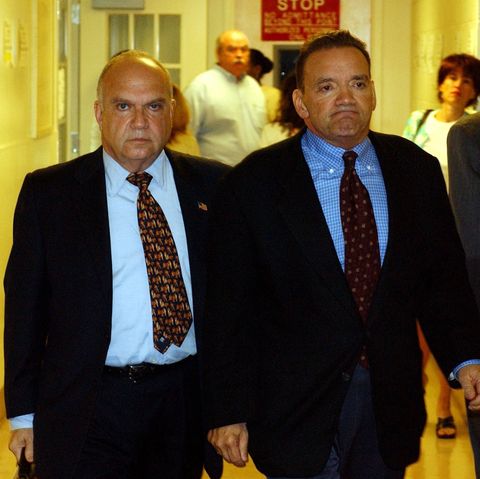 mineola, ny former roslyn school superintendent frank tassone right and his attorney john kase left appeared for a felony exam at nassau county court in mineola, new york on july 14, 2004 photo by dick yarwoodnewsday via getty images