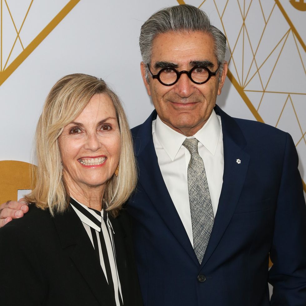 west hollywood, california   september 21 eugene levy r and his wife deborah divine l attend the showtime emmy eve nominees celebrations at san vincente bungalows on september 21, 2019 in west hollywood, california photo by paul archuletawireimage