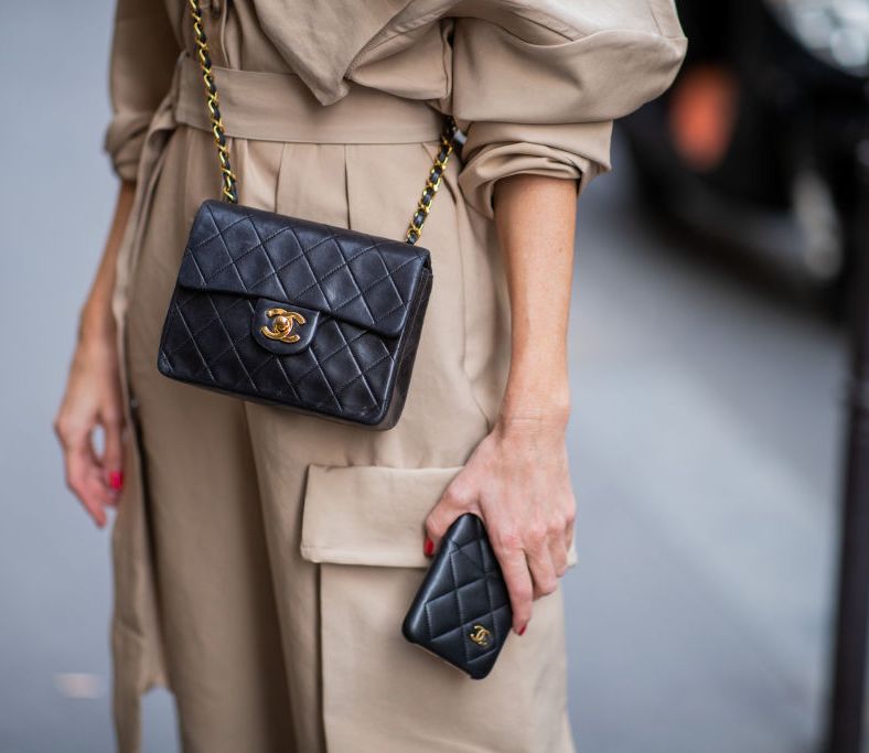 paris, france   september 23 alexandra lapp is seen wearing a beige frankie shop jumpsuit, vintage chanel classic bag, chanel i phone cover during  paris fashion week womenswear spring summer 2020 on september 23, 2019 in paris, france photo by christian vieriggetty images