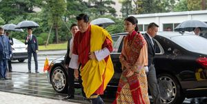 bhutans king jigme khesar namgyel wangchuck and queen jetsun pema arrive to attend the enthronement ceremony of japans emperor naruhito at the imperial palace in tokyo on october 22, 2019 photo by carl court  pool  afp photo by carl courtpoolafp via getty images