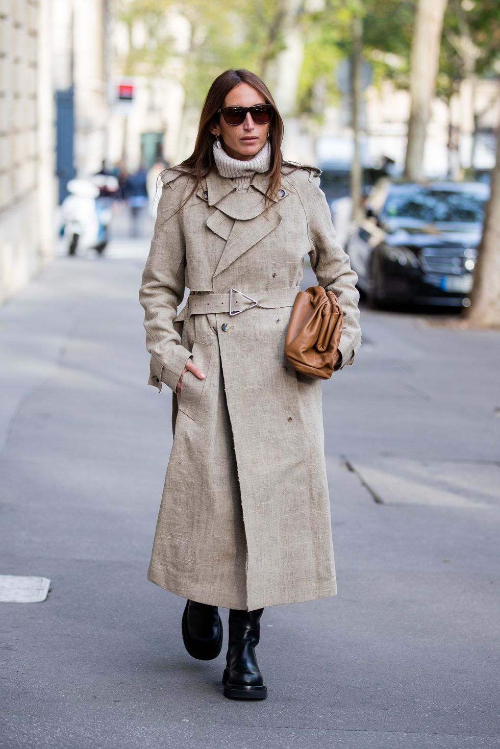 paris, france   september 27 chloe harrouche wearing trench coat, brown bottega veneta bag, boots outside alessandra rich during paris fashion week womenswear spring summer 2020 on september 27, 2019 in paris, france photo by christian vieriggetty images