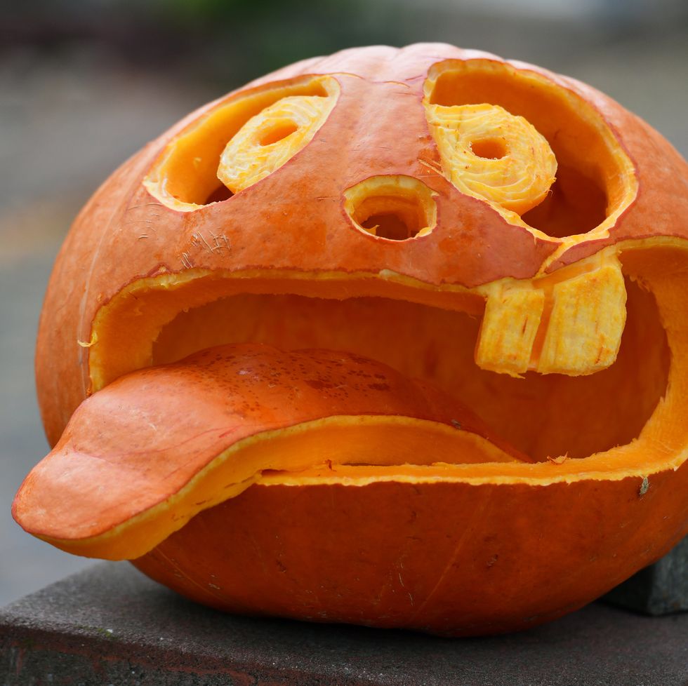 01 november 2019, thuringia, volkenroda a pumpkin with a funny face carved into it adorns a house entrance according to the weather forecasts, the coming days will also be cloudy and rainy photo frank maydpazb photo by frank maypicture alliance via getty images