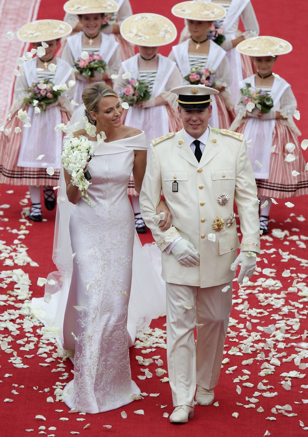 Marriage, Fashion, Red carpet, Wedding dress, Ceremony, Dress, Formal wear, Tradition, Event, Wedding, 