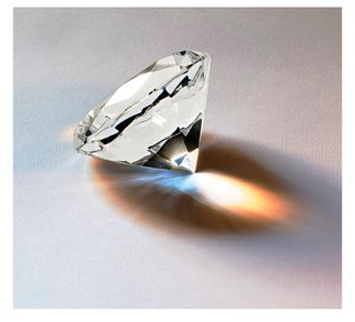 a shining diamond emitting a prism
