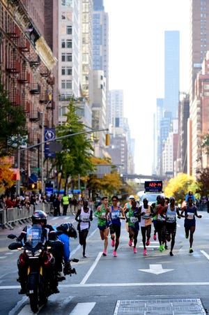 new york, new york   november 03 athletes in the mens professional division compete in the tcs new york city marathon on november 03, 2019 in new york city photo by emilee chinngetty images