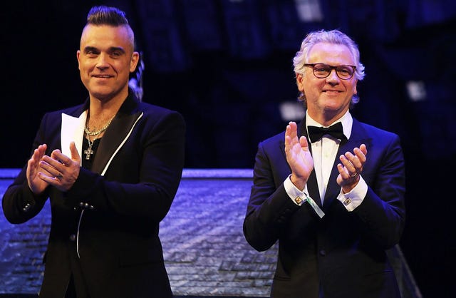 qué pasó entre robbie williams y guy chambers