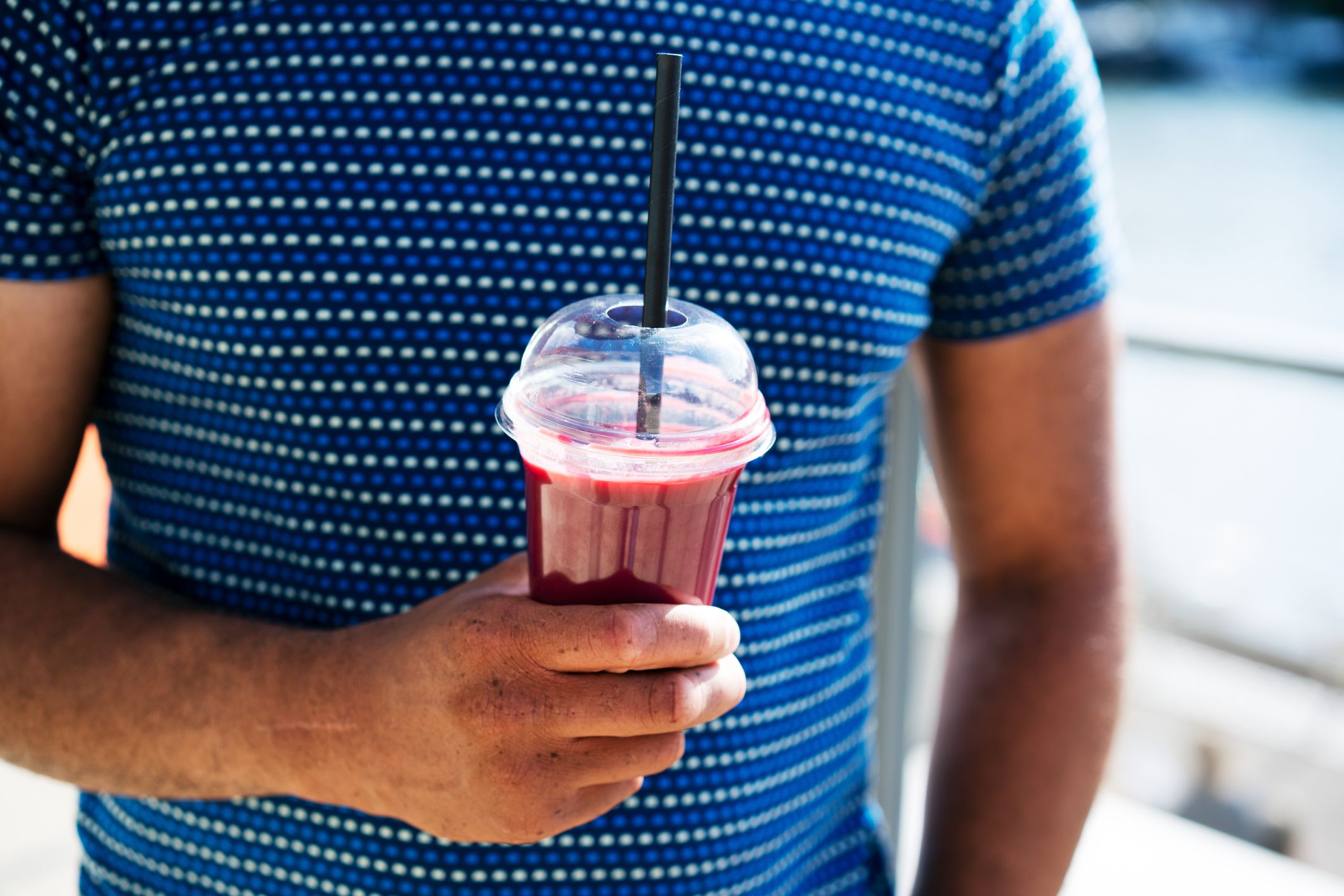 Pomegranite Smoothie sitting on white ready to drink in a to go cup Stock  Photo - Alamy