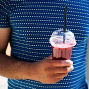 man drinking a delicious healthy smoothie for men's health magazine