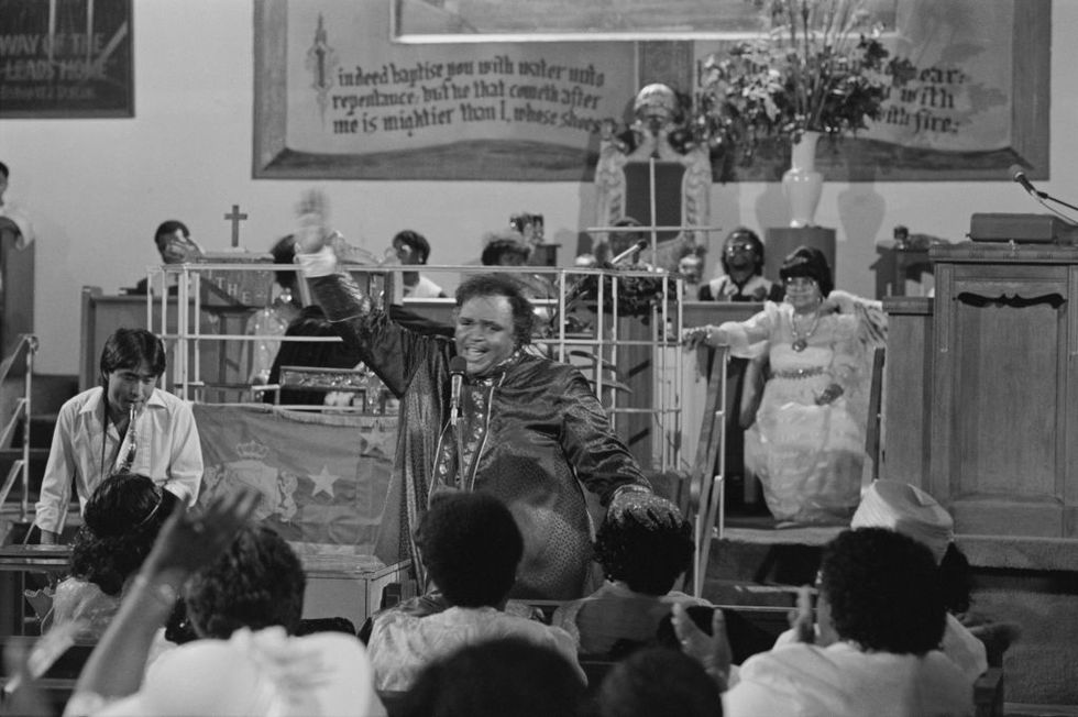 american preacher and singer solomon burke 1940   2010 is accompanied by a saxophonist during a church appearance, usa, circa 1968  photo by don paulsenmichael ochs archivesgetty images