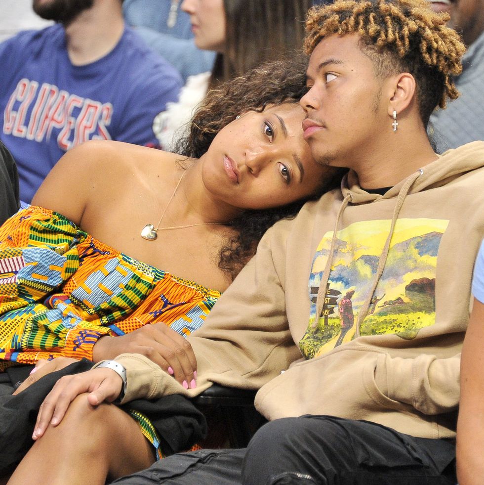 los angeles, california   december 01 naomi osaka and ybn cordae attend a basketball game between the los angeles clippers and the washington wizards at staples center on december 01, 2019 in los angeles, california photo by allen berezovskygetty images