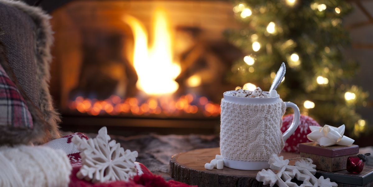christmas cozy hot chocolate in front of the fireplace