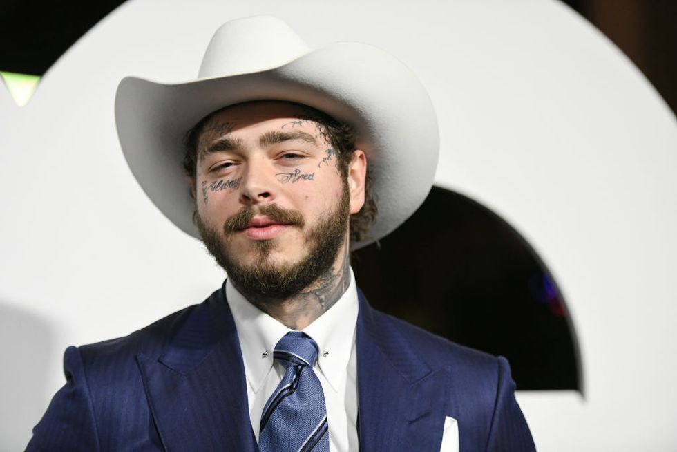 west hollywood, california december 05 post malone arrives at the 2019 gq men of the year event at the west hollywood edition on december 05, 2019 in west hollywood, california photo by morgan liebermanfilmmagic