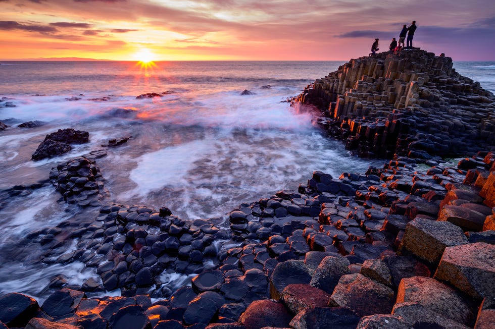 the giants causeway and causeway coast declared a world heritage site by unesco in 1986 the tops of the columns form stepping stones that lead from the cliff foot and disappear under the sea