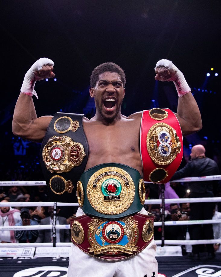 diriyah, saudi arabia   december 07  anthony joshua poses for a photo with the ibf, wba, wbo  ibo world heavyweight title belts after the ibf, wba, wbo  ibo world heavyweight title fight between andy ruiz jr and anthony joshua during the matchroom boxing clash on the dunes show at the diriyah season on december 07, 2019 in diriyah, saudi arabia photo by richard heathcotegetty images