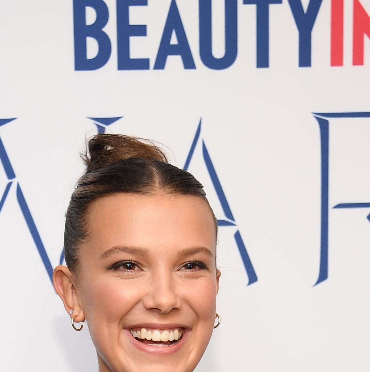 Millie Bobby Brown turns up the heat in stunning crop top in new photos