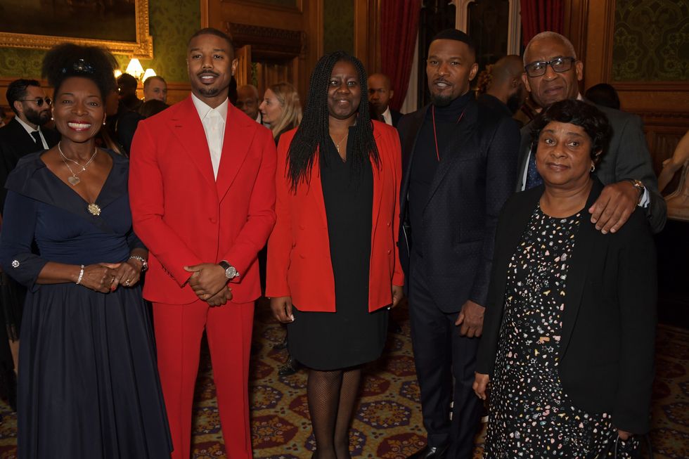 london, england   january 14 l to r  baroness floella benjamin, michael b jordan, marsha de cordova mp, jamie foxx, lord simon woolley and baroness doreen lawrence attend an evening at the house of lords for the upcoming film just mercy on january 14, 2020 in london, england photo by david m benettdave benettgetty images