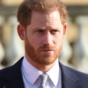 BRITAIN-ROYALS britains prince harry, duke of sussex gestures as he watches children play rugby league prior to the draw for the rugby league world cup 2021 at buckingham palace in london on january 16, 2020 photo by jeremy selwyn pool afp photo by jeremy selwynpoolafp via getty images