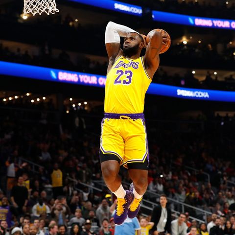 atlanta, georgia   december 15  lebron james 23 of the los angeles lakers dunks against the atlanta hawks in the first half at state farm arena on december 15, 2019 in atlanta, georgia  note to user user expressly acknowledges and agrees that, by downloading andor using this photograph, user is consenting to the terms and conditions of the getty images license agreement  photo by kevin c coxgetty images