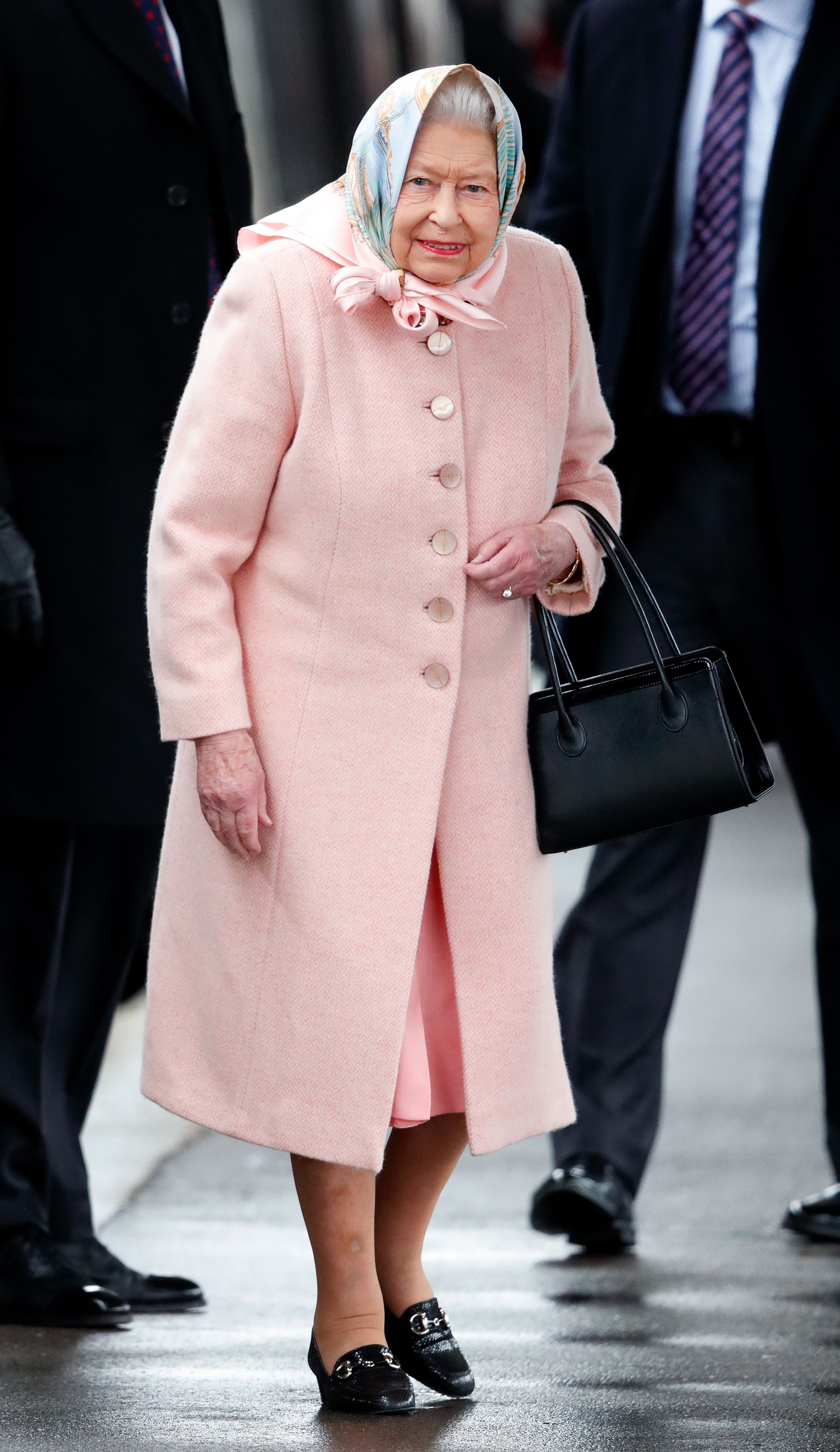 Queen Elizabeth II Wears Pink On Her Way To Sandringham