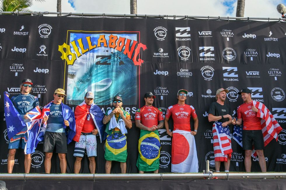 haleiwa, hawaii   december 19 l r owen wright of australia, julian wilson of australia, michel bourez of france, italo ferreira of brazil, gabriel medina of brazil, kanoa igarashi of japan, kolohe andino of the united states and john john florence of hawaii the provisional 2020 tokyo olympics qualification surfers are on the podium during the 2019 billabong pipe masters on december 19, 2019 in haleiwa, hawaii photo by koji hiranogetty images