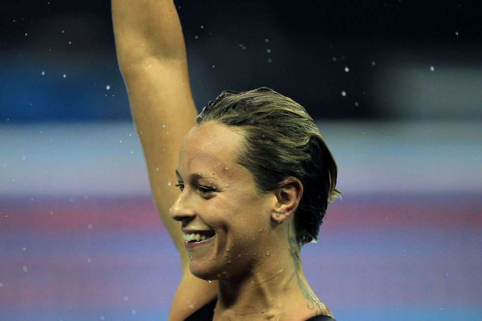 shanghai, china   july 24  federica pellegrini of italy celebrates after winning the gold medal in the womens 400m freestyle final during day nine of the 14th fina world championships at the oriental sports center on july 24, 2011 in shanghai, china  photo by ezra shawgetty images