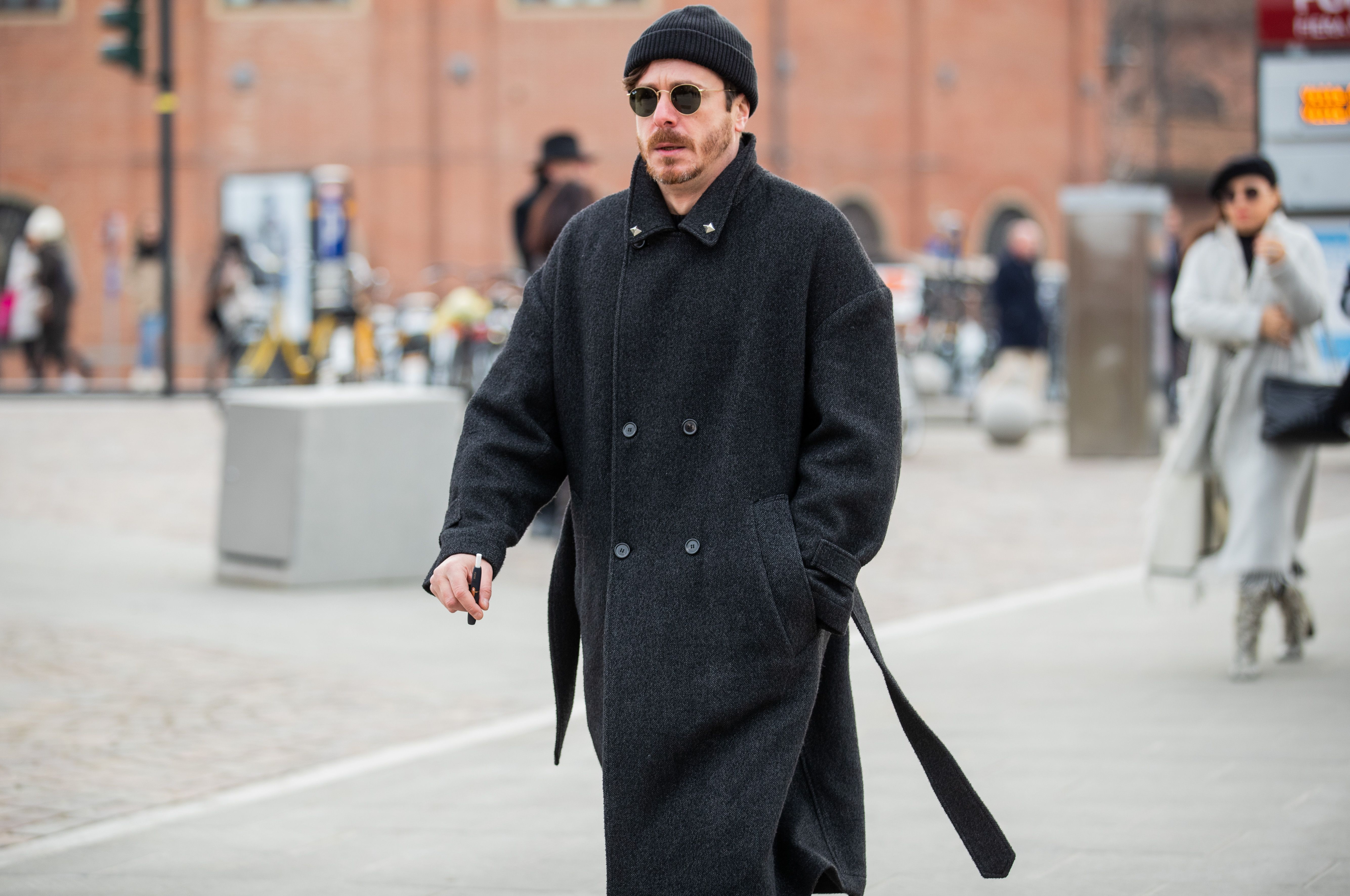 Street Style at Pitti Uomo Shows How to Fashionably Deal With the Cold