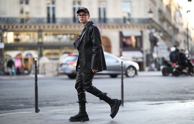 paris, france   january 18 erik scholz wearing a ksenia schnaider suit, bottega veneta boots, daily paper cap, dior sweater and bag on january 18, 2020 in paris, france photo by jeremy moellergetty images
