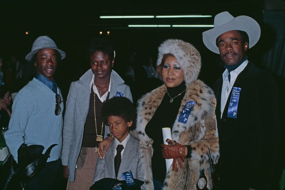 american singer, songwriter, pianist, and civil rights activist aretha franklin 1942   2018, wearing fur coat and hat, attends the hollywood christmas parade with her husband glynn turman, her son kecalf cunningham, her stepson and her stepdaughter stephanie turman, los angeles, us, 23rd november 1978 photo by michael ochs archivesgetty images