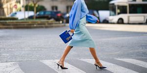 paris, france   january 21 leonie hanne wears a blue ruffled top, a pale blue skirt, a blue lady dior bag, dior pointy shoes, during paris fashion week   haute couture springsummer 2020, on january 21, 2020 in paris, france photo by edward berthelotgetty images